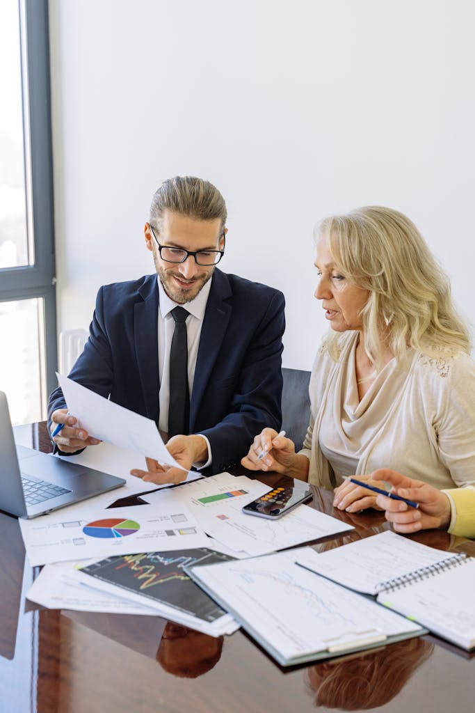 Two business professionals reviewing consultanacy by MoveXis
